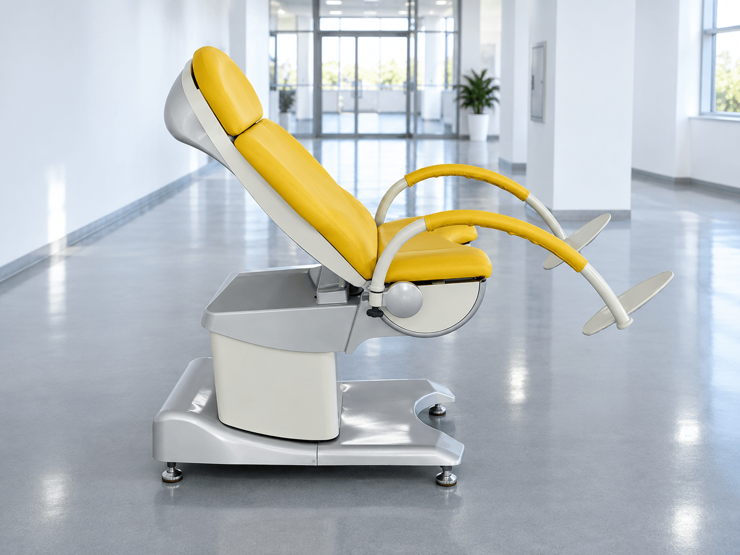 Yellow reclining examination chair in a clean showroom corridor.
